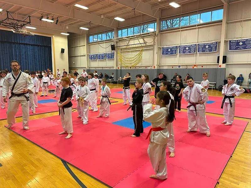group of kids practicing for kids taekwondo lessons