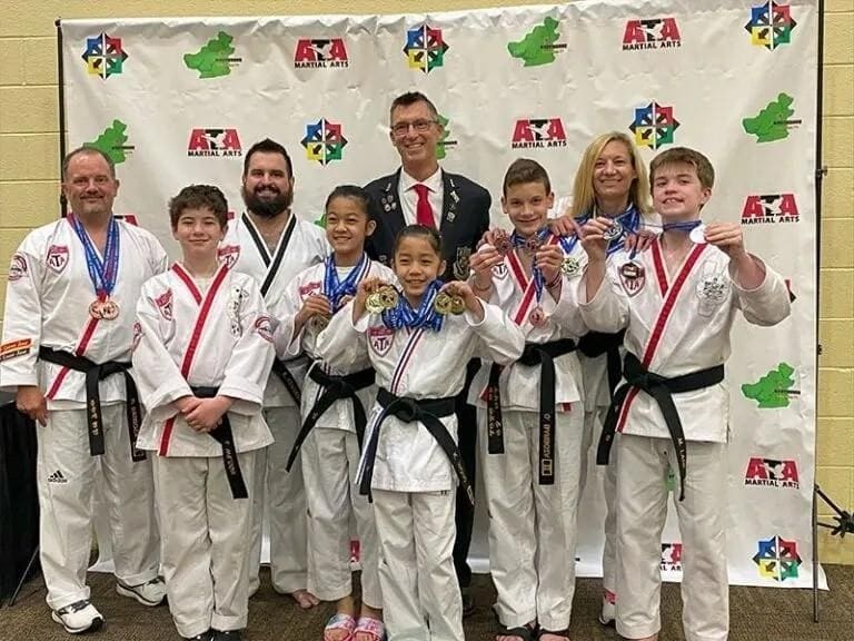 group of students being happy and confidence during teens self defense class